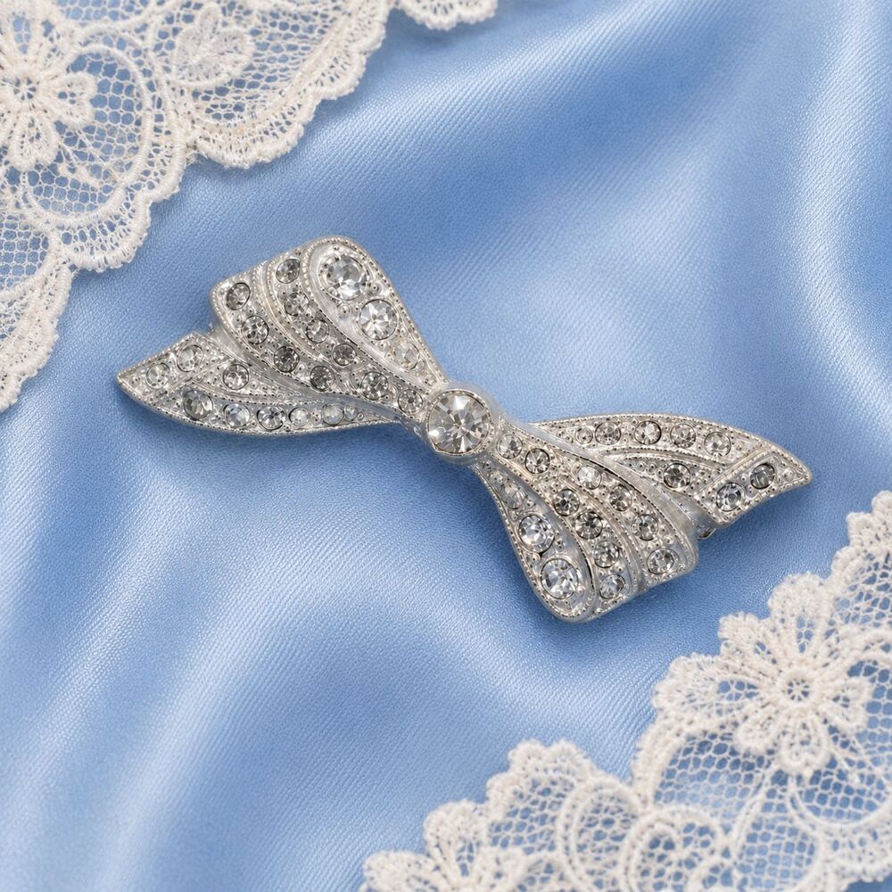 Vintage Pot Metal Rhinestone Bow Pin